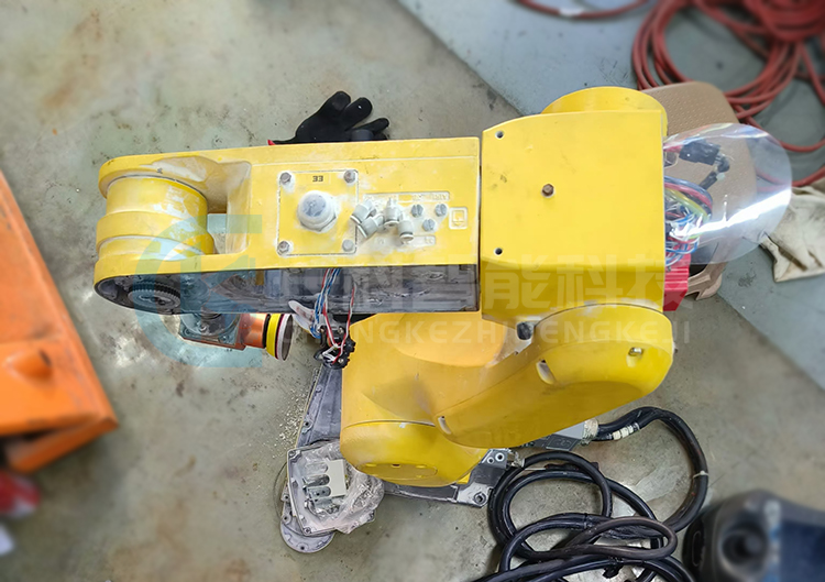 Repair the Fanuc robot LR Mate 200iD that has been submerged in water